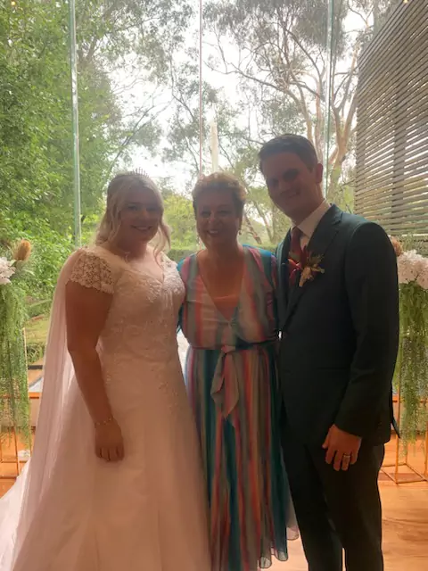Josie with a wedding couple